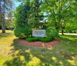 Photo of the granite Pennichuck sign, Nashua, NH.